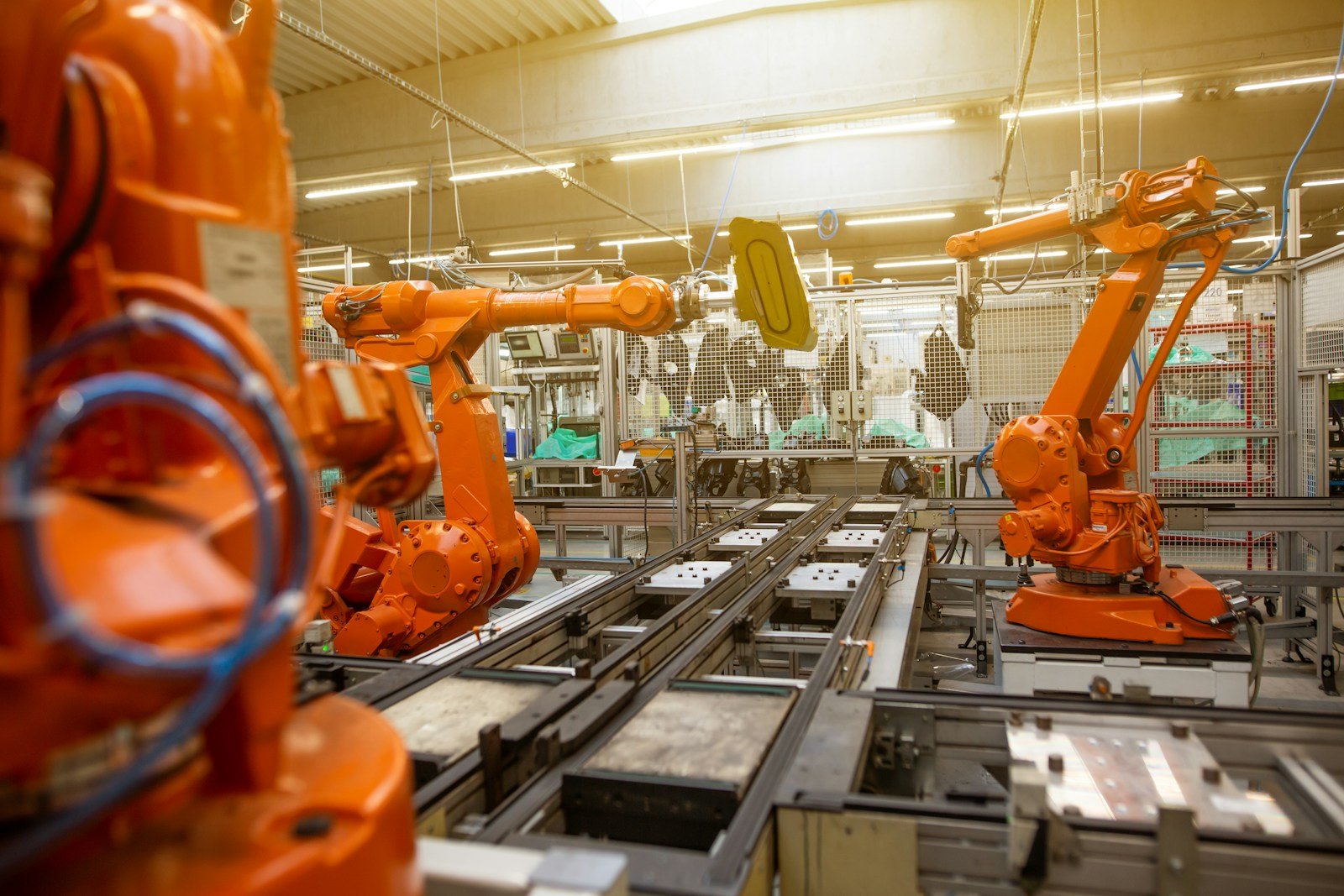 Industrial robotic automation factory representing robotics computing and networking